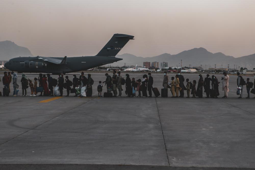 Kabul Airlift Continues After Suicide Bombing Kills 13 Troops, Dozens of Afghans