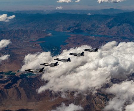 Edwards F-35 Integrated Test Flight test pilots fly a Technical Refresh 3 (TR-3) flight test at Edwards Air Force Base, Calif., in August. Five aircraft, equipped with TR-3 hardware and software, flew together, and represented a continuation of the extensive flight test campaign underway. TR-3 provides the computational horsepower to support modernized Block 4 capabilities and ensure the F-35 remains superior to adversaries for decades to come. (Photo courtesy of Lockheed Martin/Darin Russell)