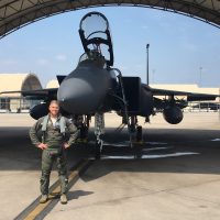 Pratt & Whitney F-100 Program Senior Manager Nick 'JDAM' Graham poses with an F-15E. Nick flew 220 combat sorties in the F-15E over Afghanistan and Iraq.