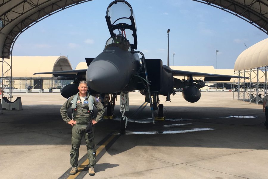 Pratt & Whitney F-100 Program Senior Manager Nick 'JDAM' Graham poses with an F-15E. Nick flew 220 combat sorties in the F-15E over Afghanistan and Iraq.