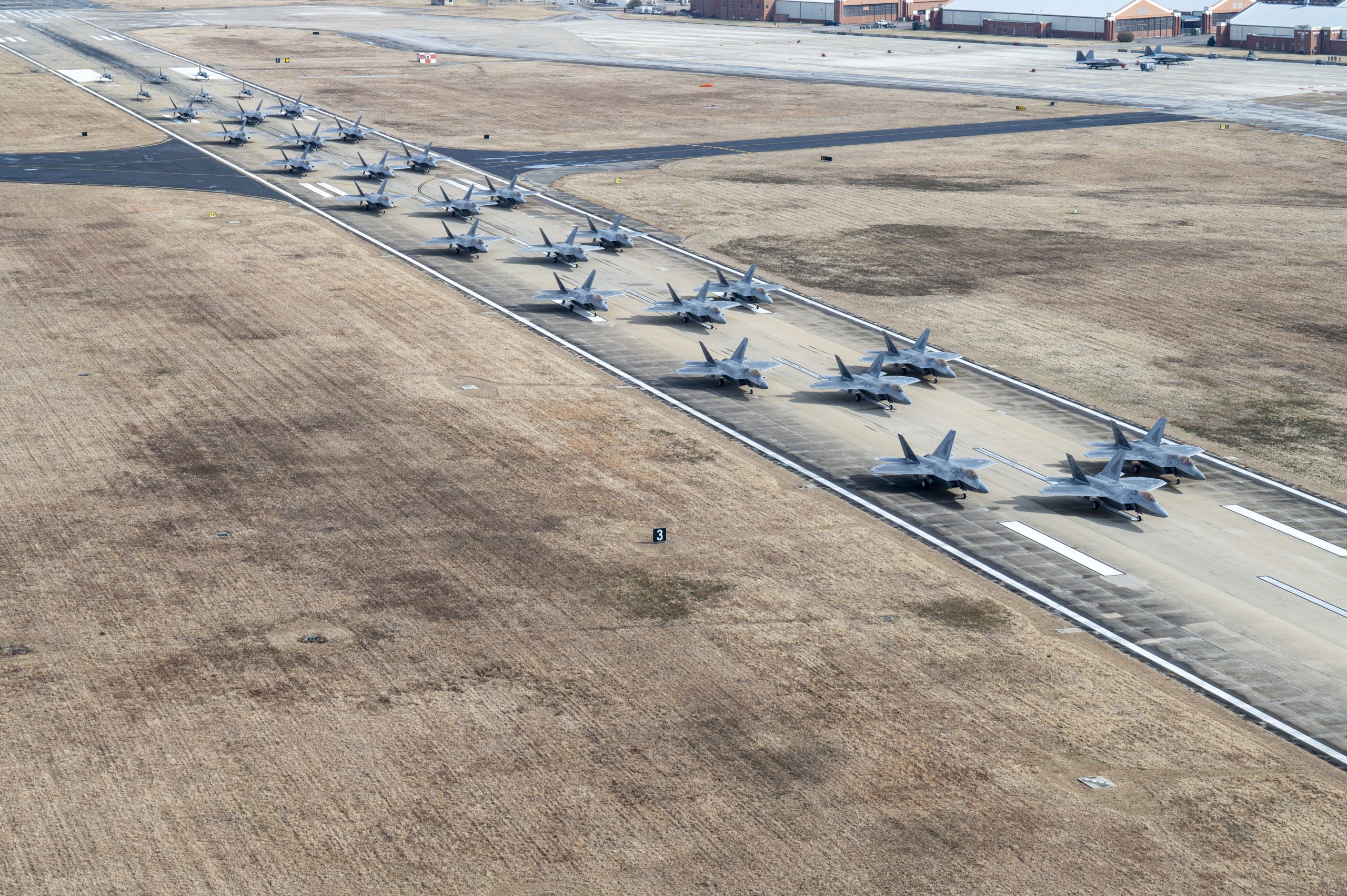 PHOTOS: Two Dozen F-22s Gather for Impressive Elephant Walk